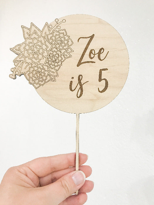 Engraved flower personalized name is age birthday cake topper