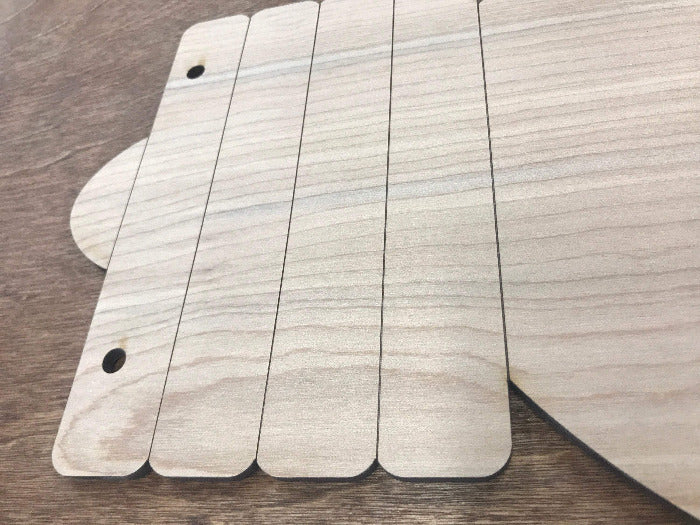 up close of engraved c9 light bulb threads cut in Glowforge laser