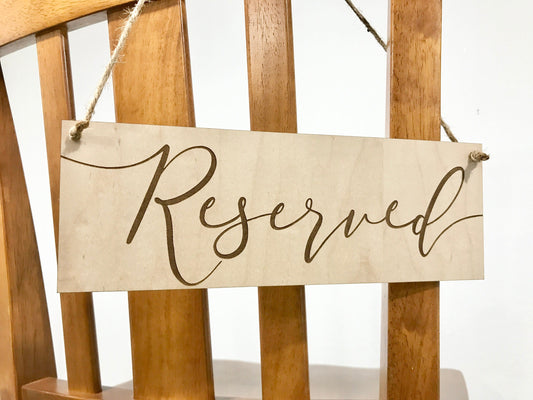 hanging reserved sign - calligraphy font