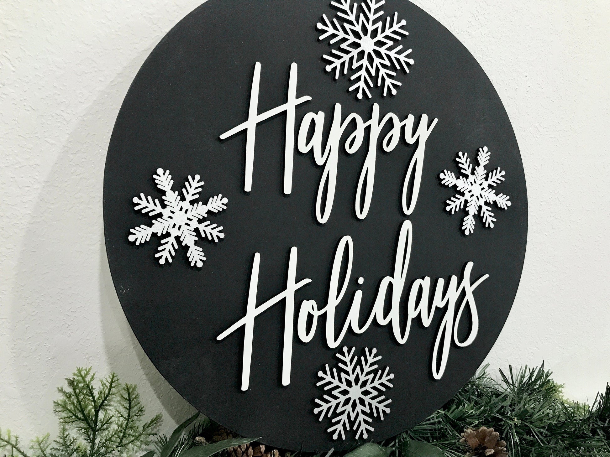 black and white happy holidays sign