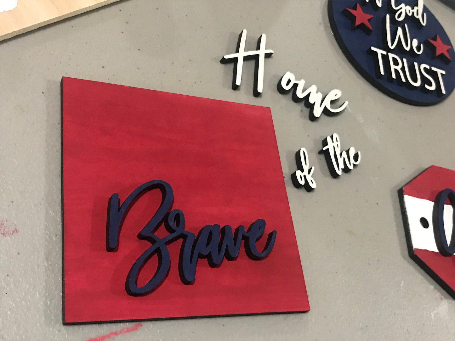 in progress painting of diy home of the brave mini sign for tiered tray