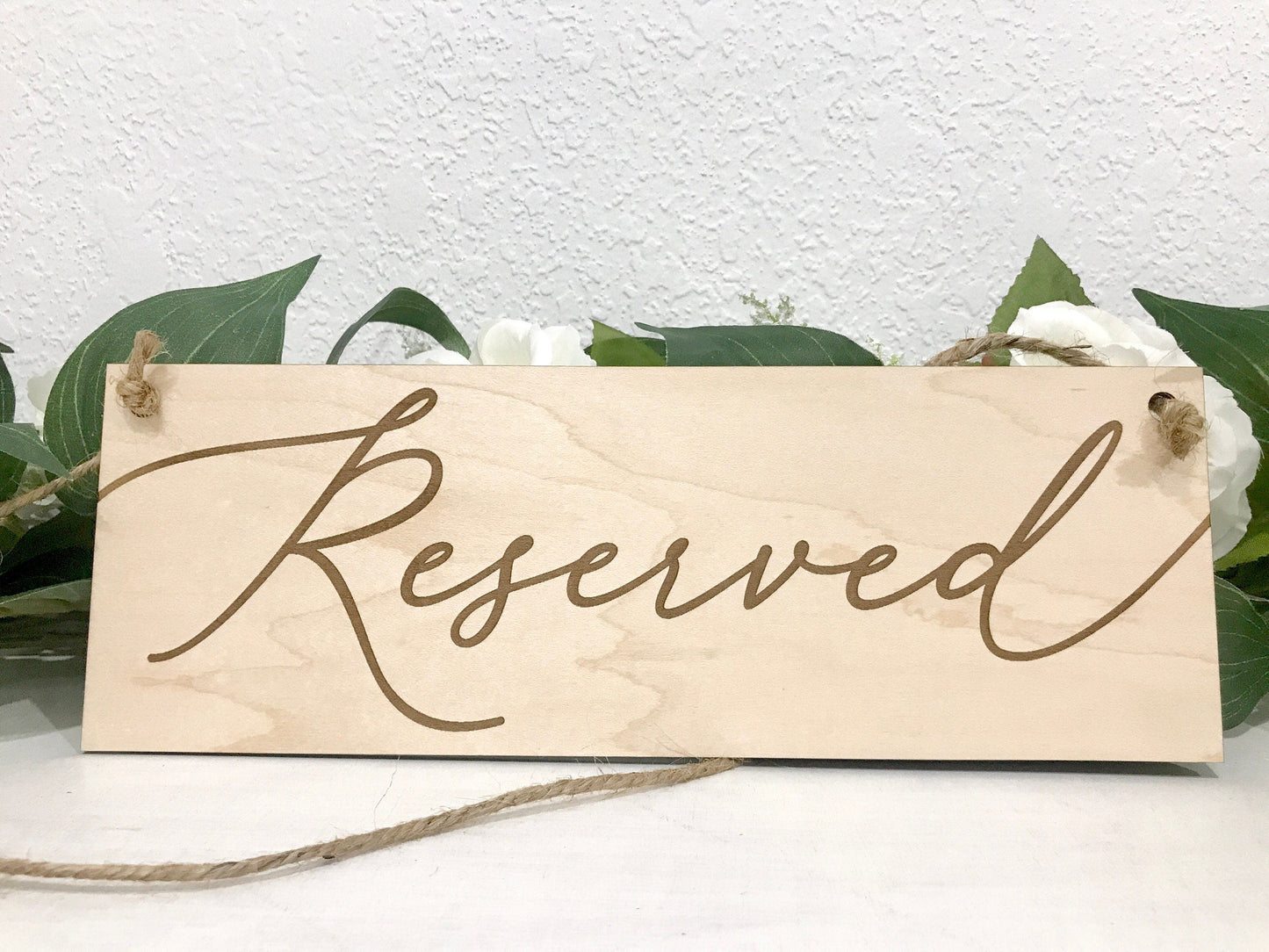 hanging reserved sign for weddings - Celebrating Together