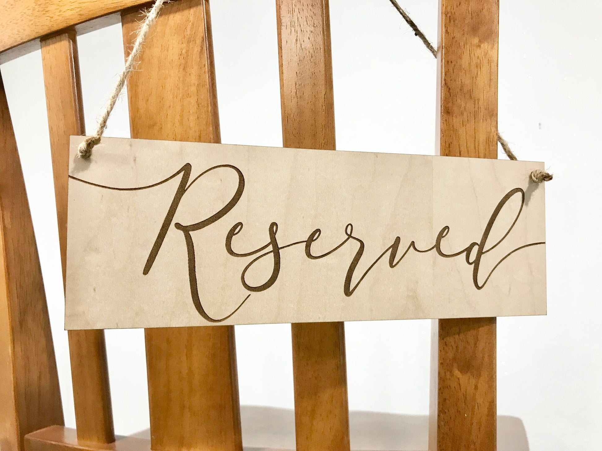 hanging reserved sign - calligraphy font 